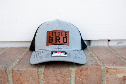 Brother Custom Leather Patch Hat - Crafthouse Hats leather patch hat company. Custom leather patch hats, also available in bulk or wholesale. Custom leather logo hats, custom leather hats, custom patch hats, leather logo hats, custom leather patches, custom logo leather hats, Richardson leather patch hats, Richardson 112 camo hats, yupoong camo trucker hats, leather hat patches, custom camo hats, leather hat, leather patch for hats, legacy hats, custom party hats, personalized camo hats, custom leather patc